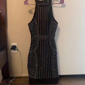 knee- length body con sparkly dress